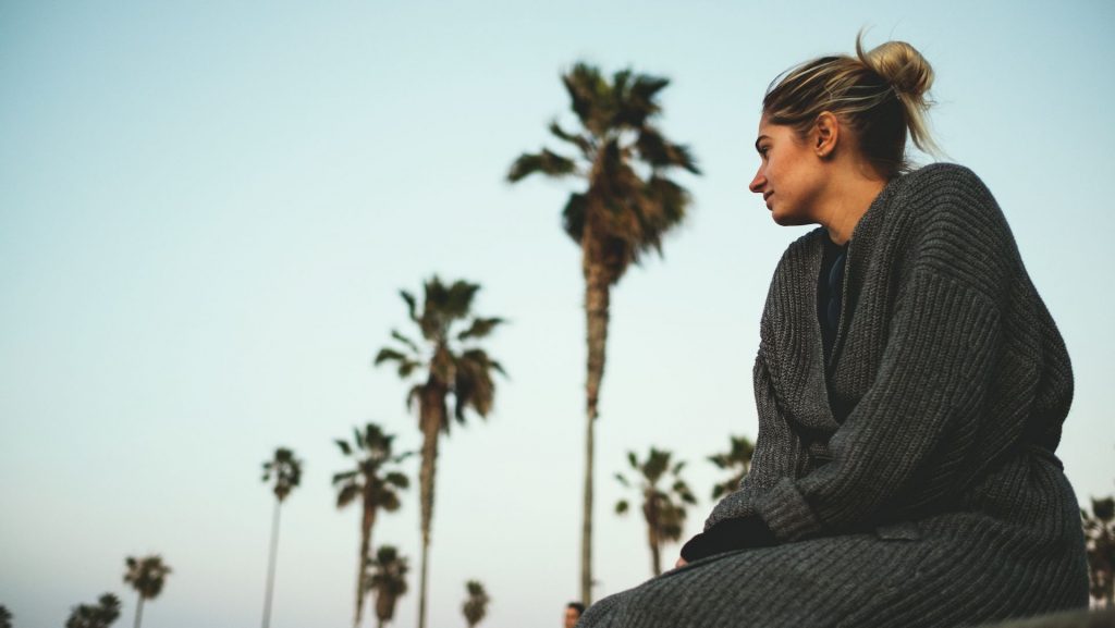 girl, lady, female, palm trees, jumper, blue skies, sunset, dusk, dawn